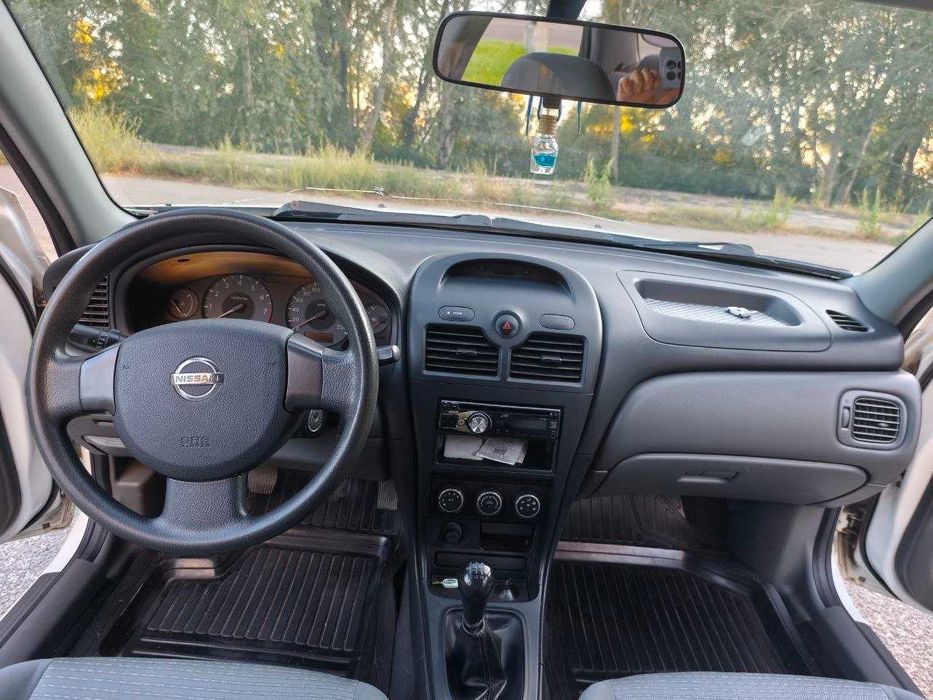 Nissan Almera 2012 VIN KNMCSHLMSDP890885 фото оголошення 12 з 13