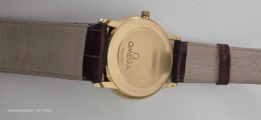 Złoty zegarek omega