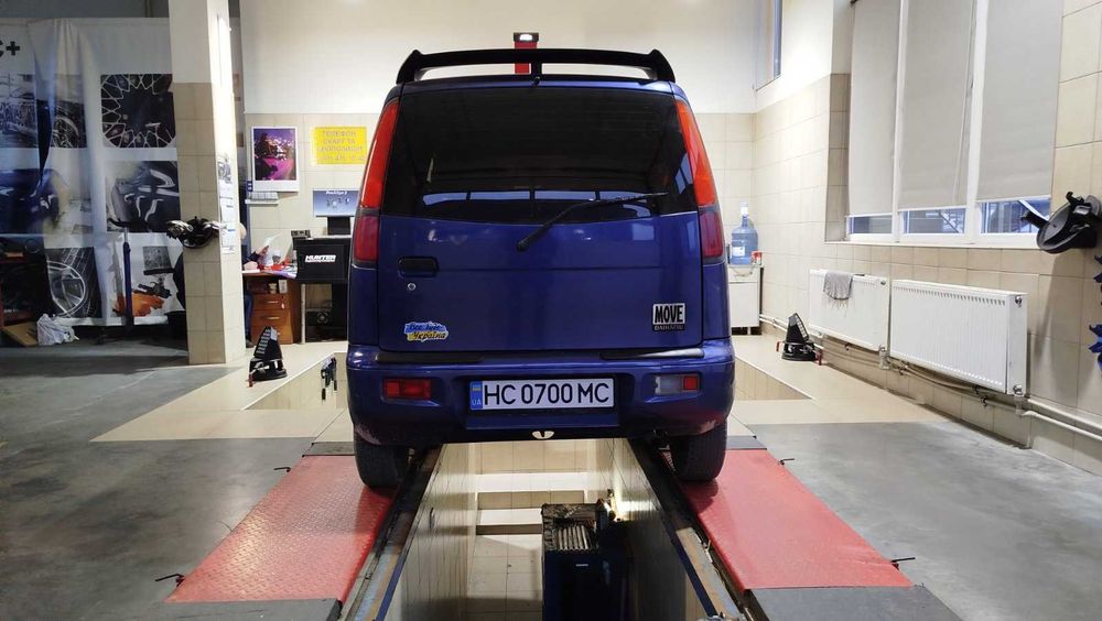 Автомобиль дэйхатсу мув