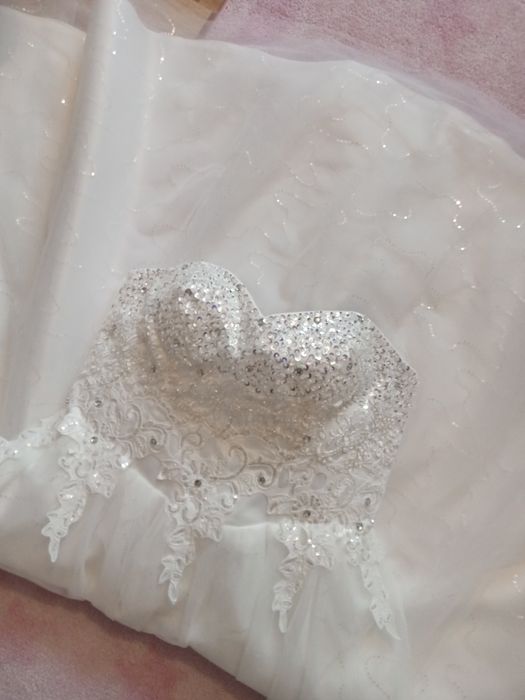 Nowa suknia ślubna 44-48