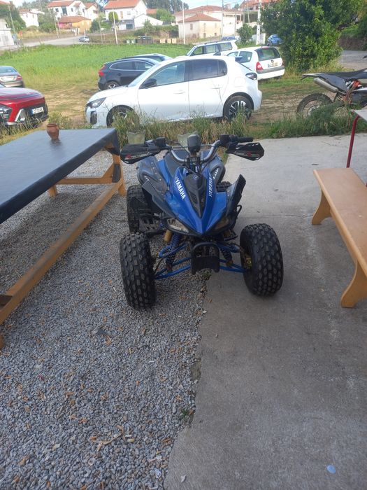 Moto 4  vendo uma 125c