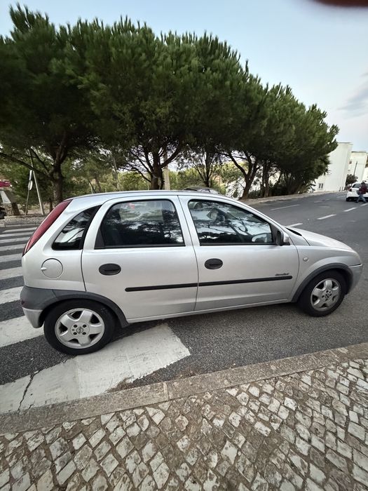Opel Corsa 1.2 c/ teto de abrir — photo 4