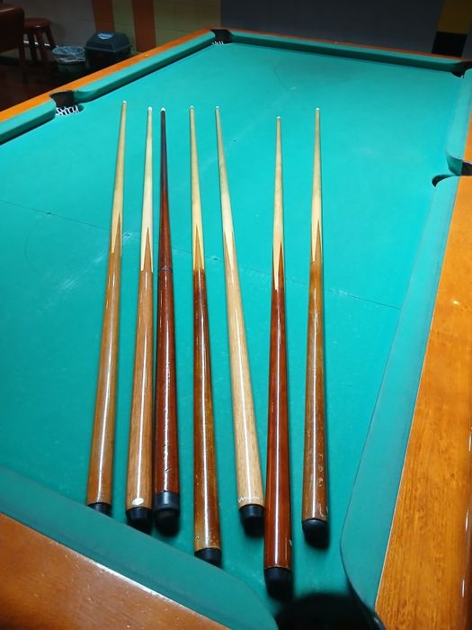 Tacos de bilhar usados