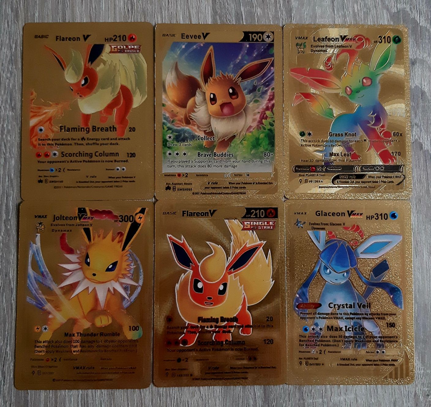 Cartas de Pokemon Gold Evee and Evolutions Ponte De Sor, Tramaga E