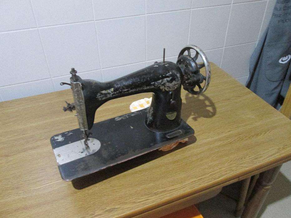 cabeça de máquina de costura