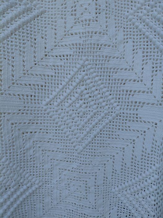 Colcha de renda feita à  mão