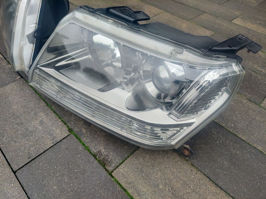 Reflektor lampa przód prawa lewa /europa/ Suzuki Grand Vitara II 2
