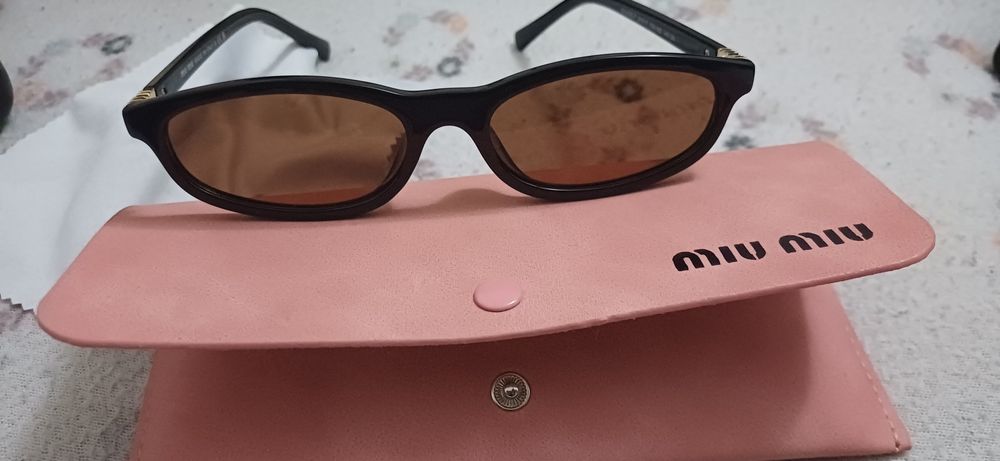 Óculos castanho miu miu
