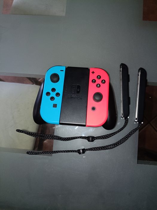 Nintendo Switch Oled Como Nova Com Quatro Jogos De Oferta