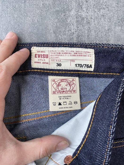 Джинсы Evisu