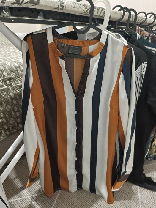14 koszul w rozmiarze S/M lub oversize. Bez zniszczeń