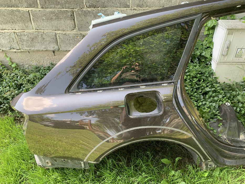 Audi A6 C7 AVANT blotnik prawy tyl cwiartka