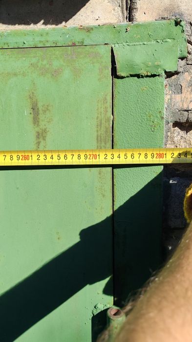 Ворота гаражні розпашні металеві