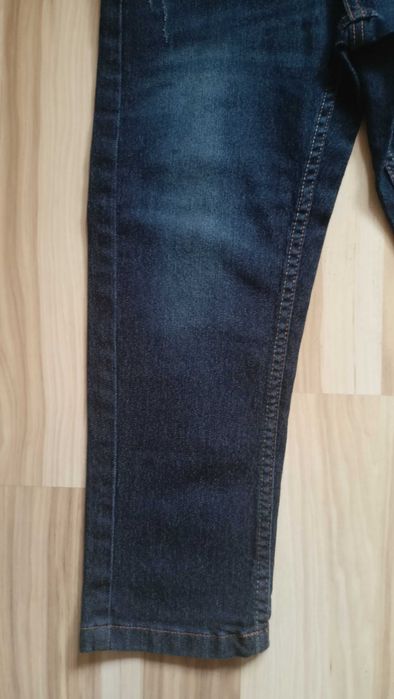 nowe z metką spodnie ciemny jeans 110/116