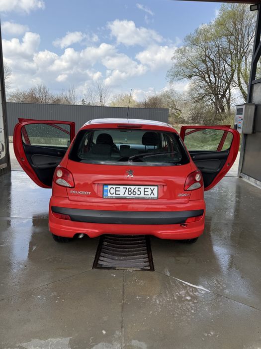 Машина Пежо 206+