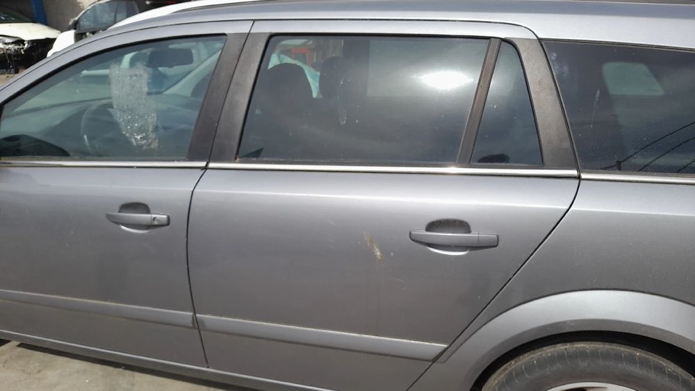 Porta trás esquerda OPEL Astra H Caravan (L35)