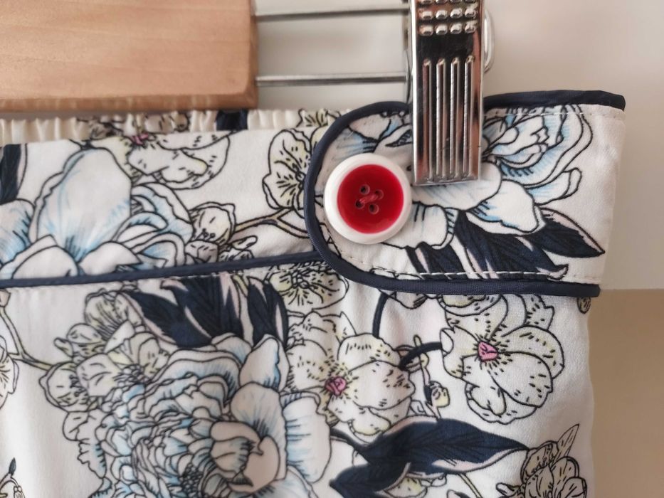 Calças estampadas brancas com bolsos