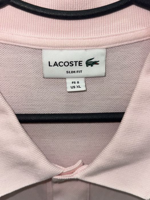 Поло Lacoste.