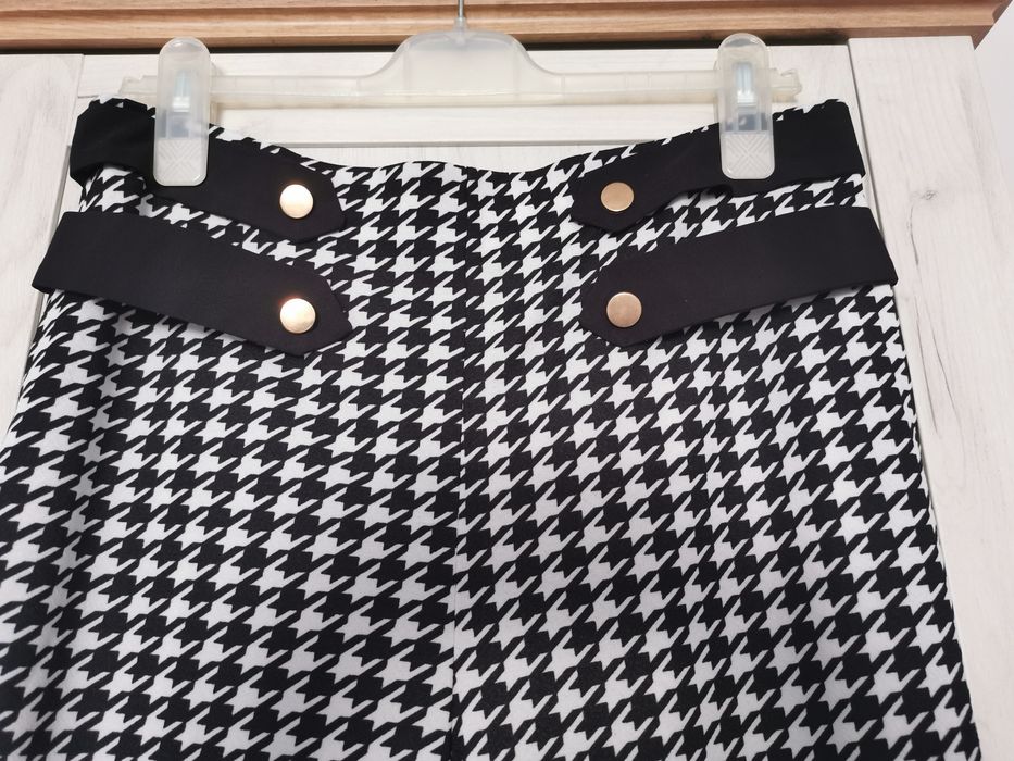 Nowe damskie spodnie w biało - czarną pepitkę