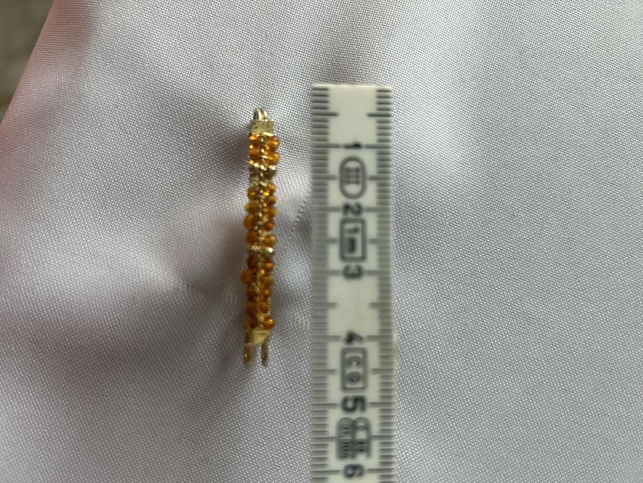 Broszka, agrafka z bursztynkami