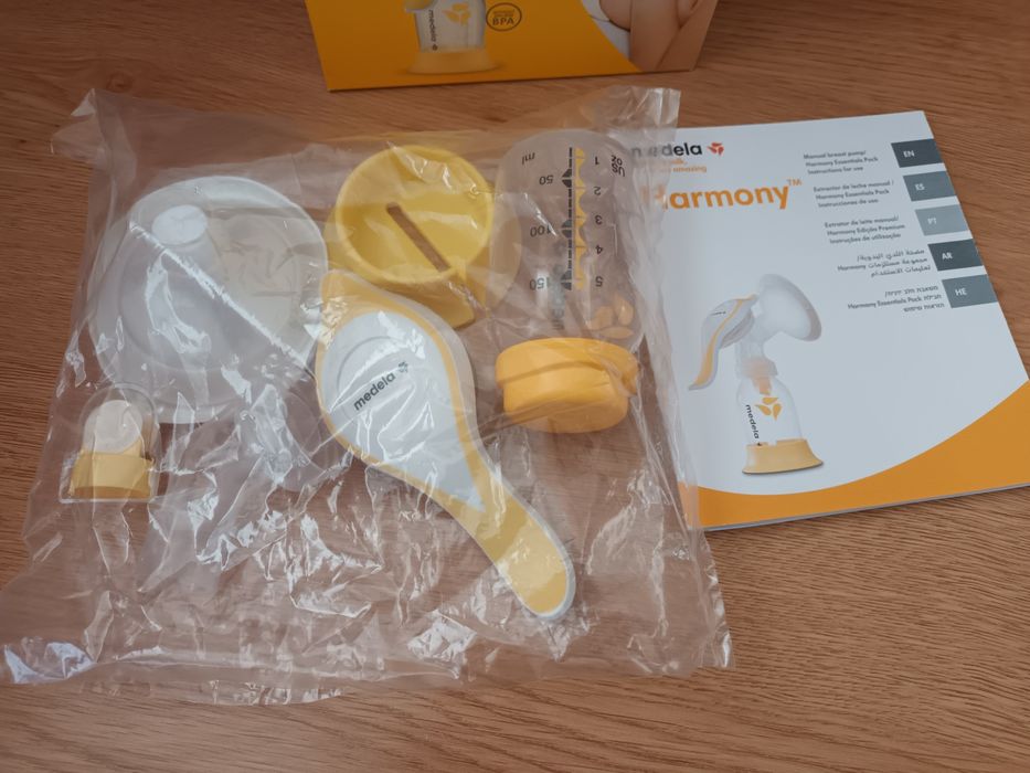 Medela Store & Feed Set e Bomba Tira-Leite Manual Harmony novo