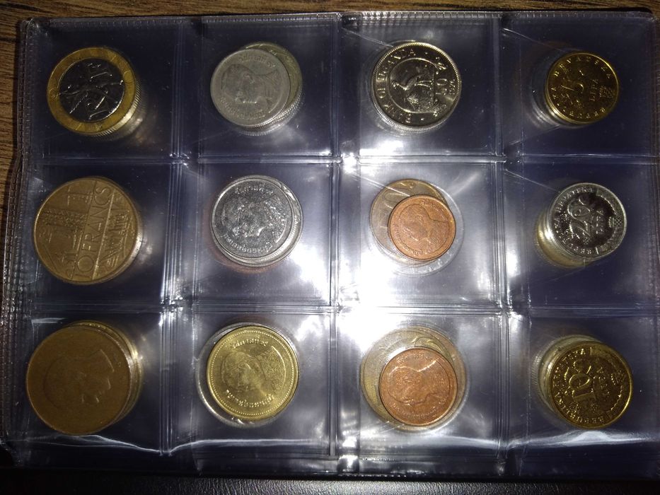 Klaser z monetami świata 96 zł , każda inna. 7