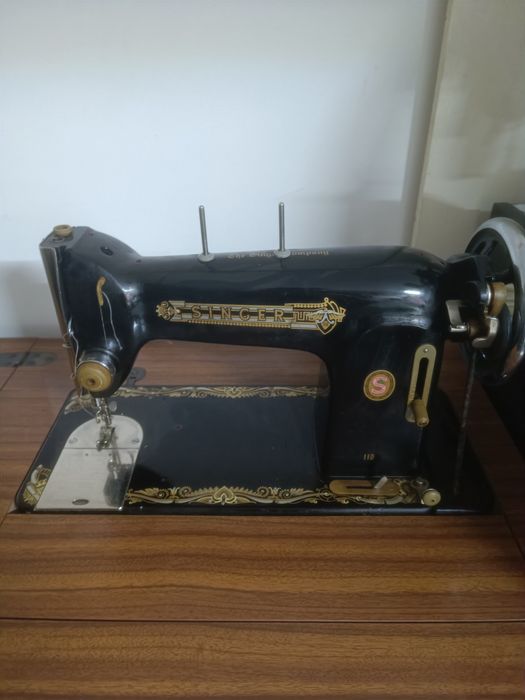 Máquina de costura singer