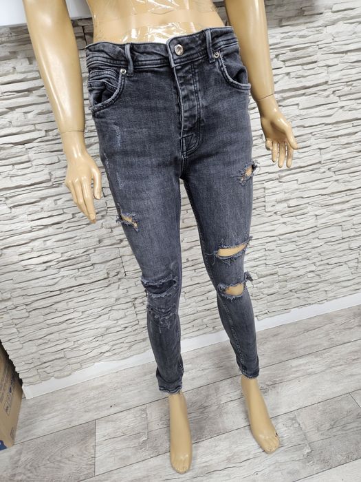 Super modne spodnie jeansowe damskie czarne Zara rozmiar 42 z przetarc