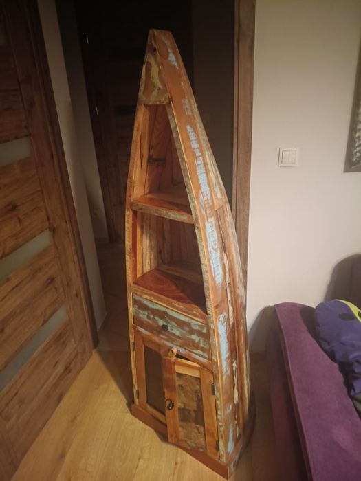 Szafka , regał w kształcie łódki, czółno.