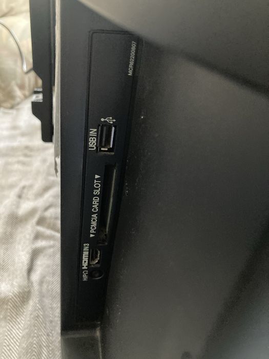 Televisao lg com apoio de parede