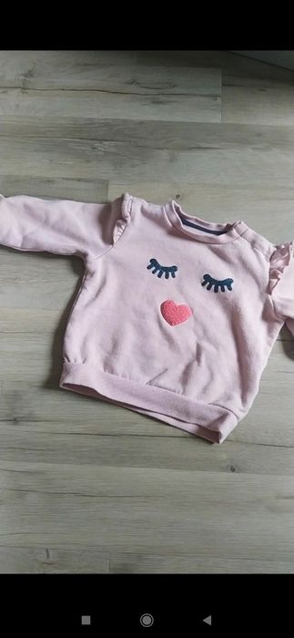 Bluza z oczami i falbanką 74/80
Pocopiano