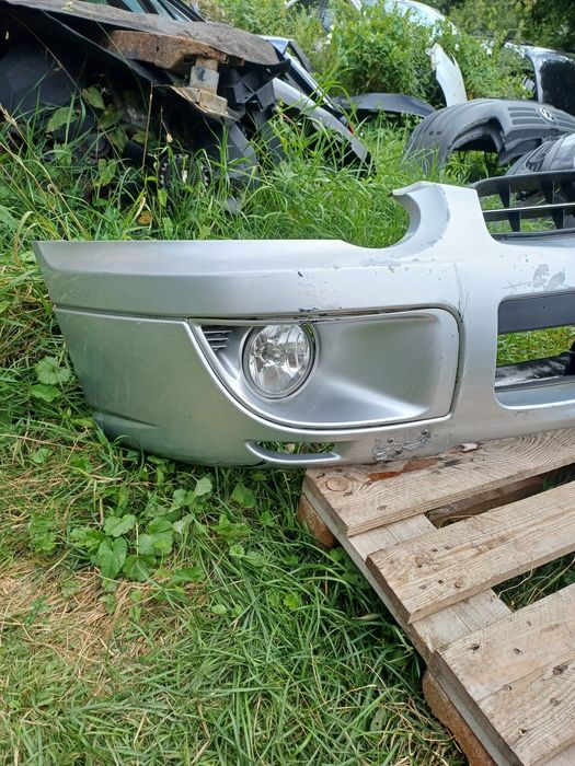 Subaru Impreza 03-05 рік передній бампер бампера 57704FE080