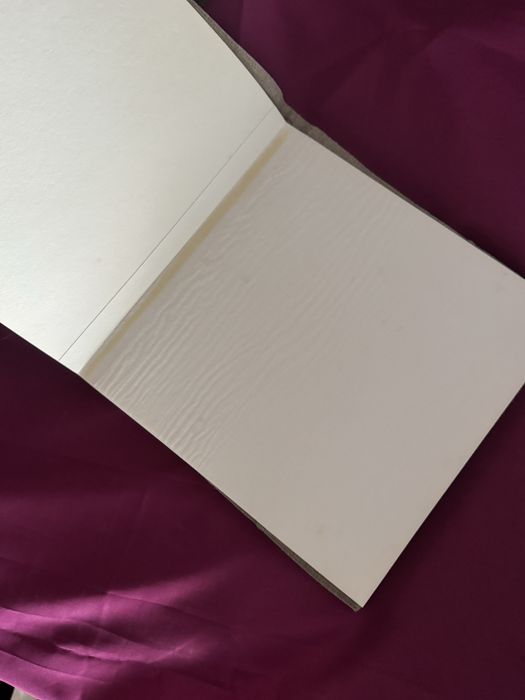 Álbum de fotografias em linho