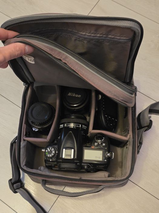 Комплект Nikon D7000 + об'єктиви + спалах і синхронізатор Godox в сумці.