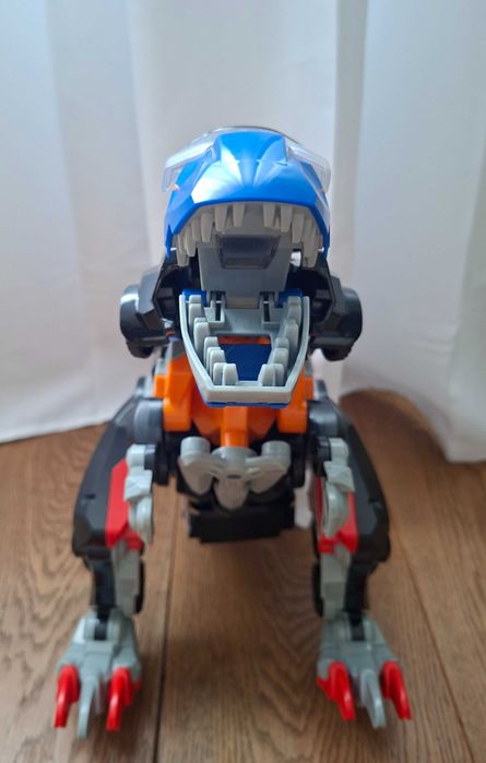 Dinozaur Transformer VTech Switch & Go Mega T-Rex 3w1 Niemiecki