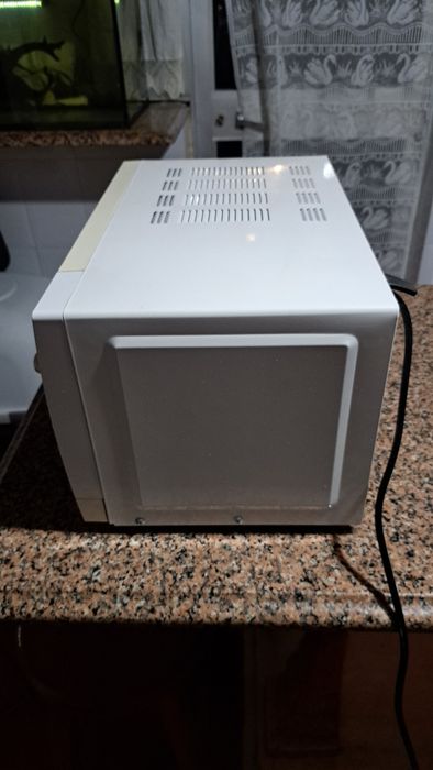 Vendo microonda com novo