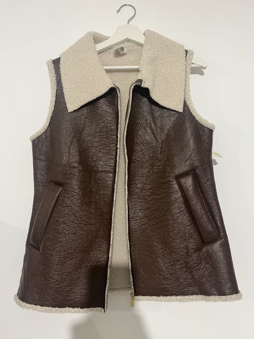 Нова жилетка жіноча