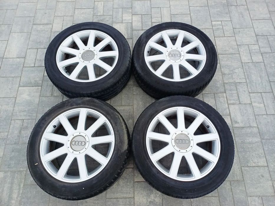 FELGI Z OPONAMI KOŁA ALUMINIOWE AUDI A3 A4 A6 A8 R18 5X112 ET43 8Jx18H2 4E0601025AB NR24