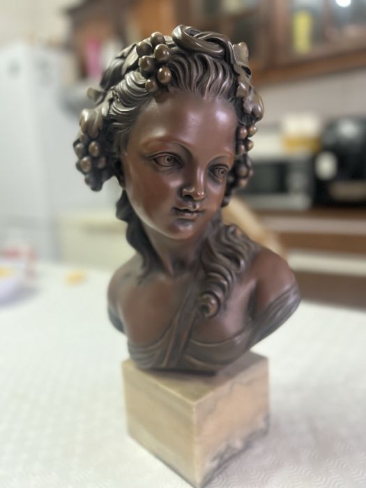 Antiga escultura busto