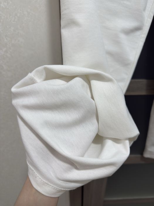 Білі штани палаццо