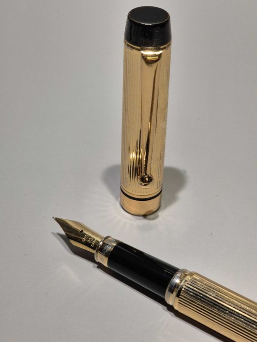 Caneta de Aparo Iridium Point Germany, em dourado e preto
