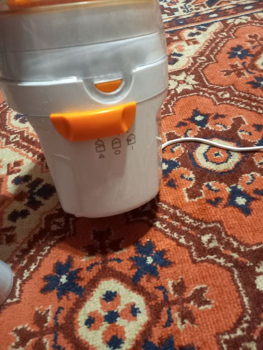 Електрична соковижималка