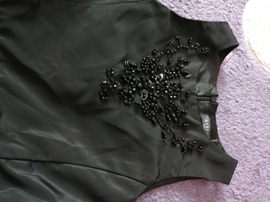 Piękna sukienka Reserved r. 134