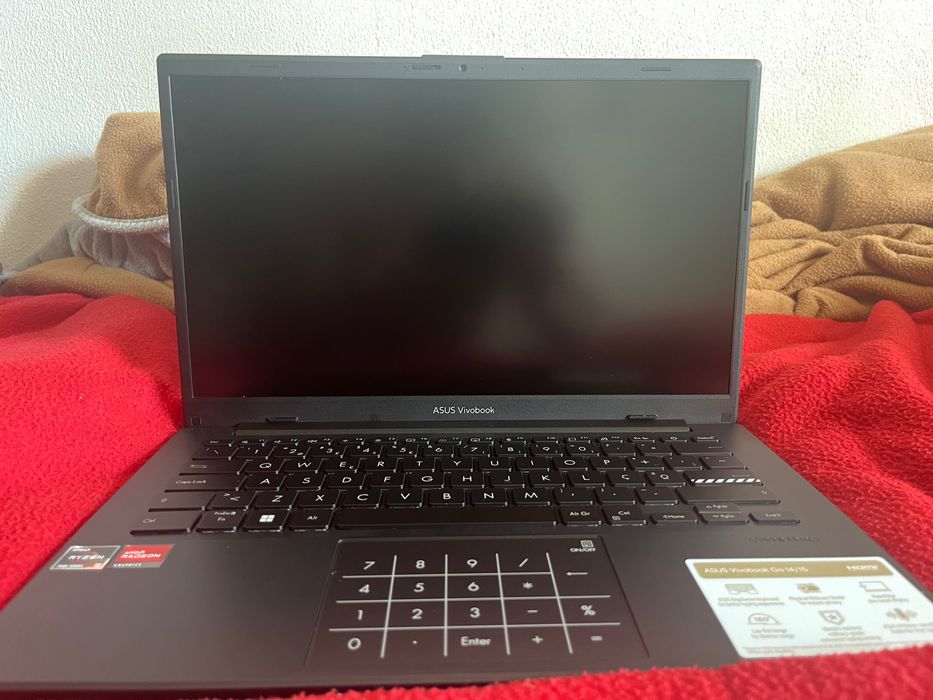 ASUS Vivobook Go 14 – Like New + Mouse + Laptop Backpack64584690078338123