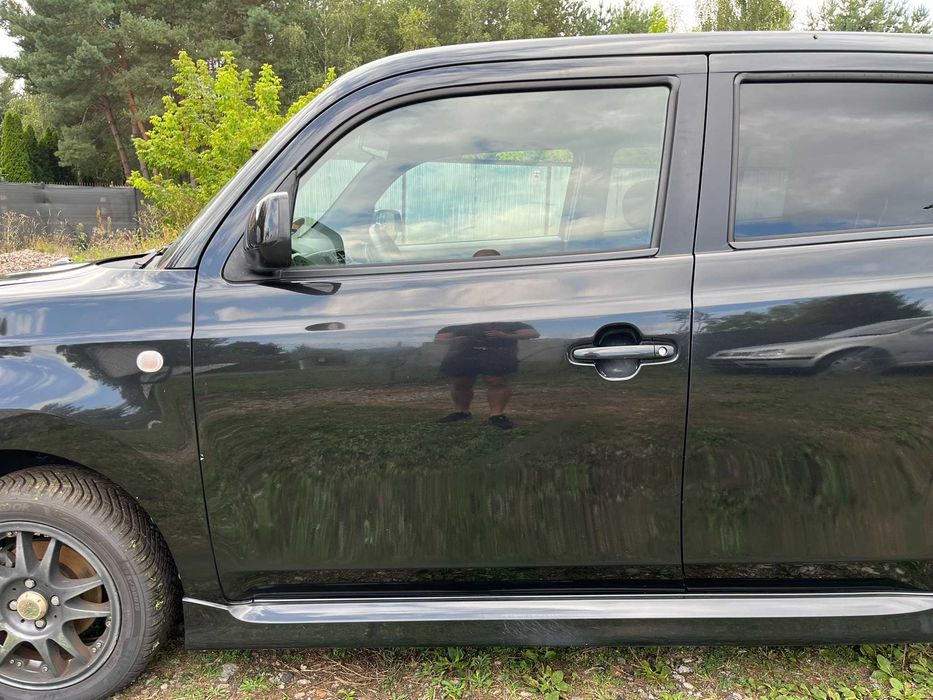 drzwi przód przednie lewe daihatsu materia x07 czarne 2006 - 2011