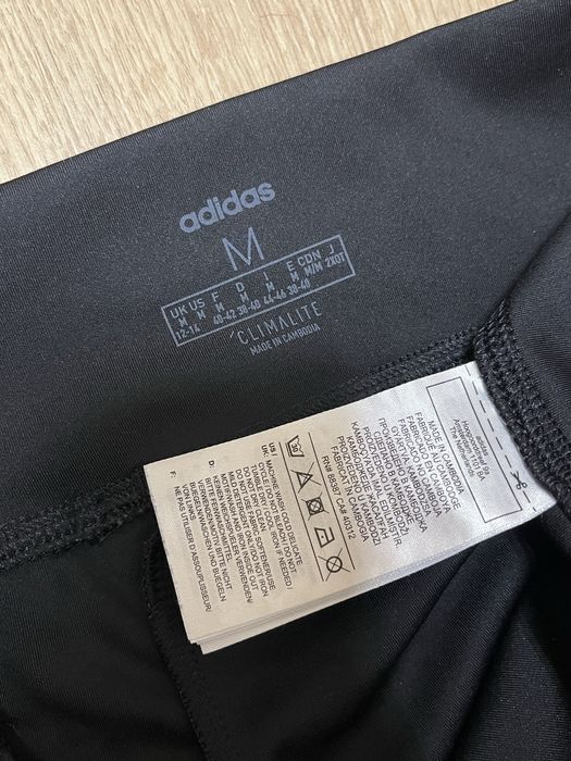 Фирменные спортивные штаны-лосины Adidas, размер М (44-46)