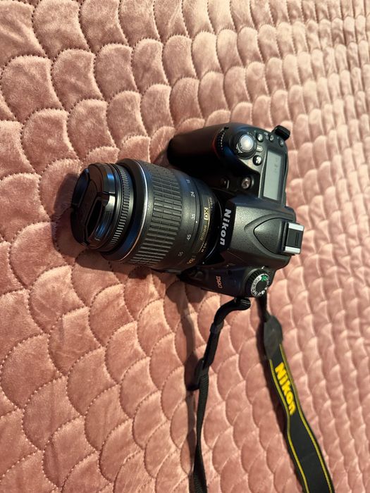 Nikon D90 + Lente