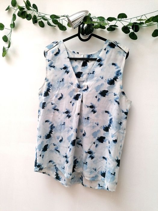 Blusa de Cavas com tons azuis