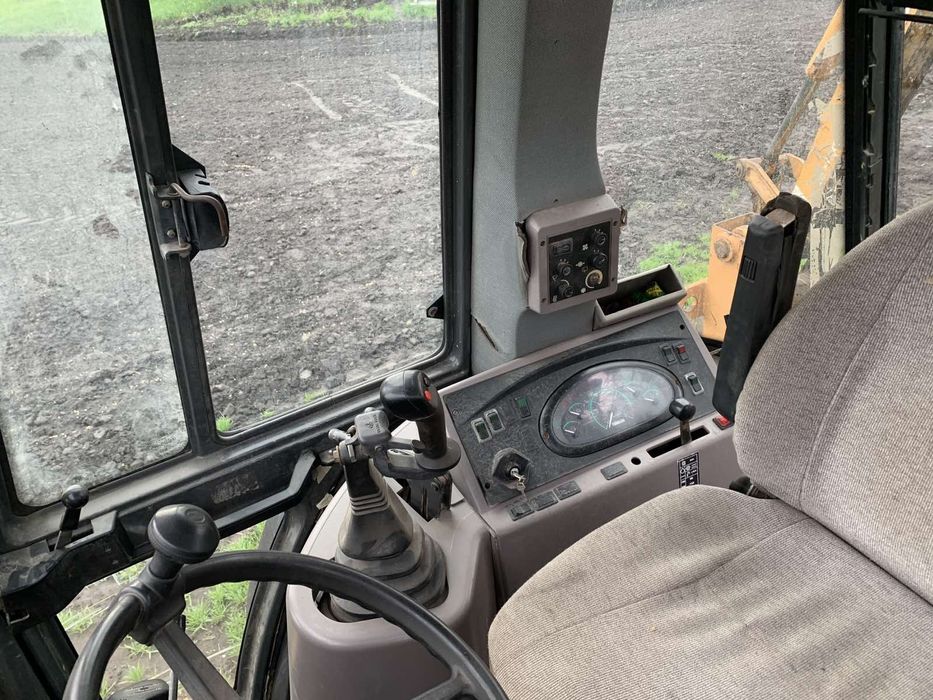 Case 580SM екскаватор навантажувач