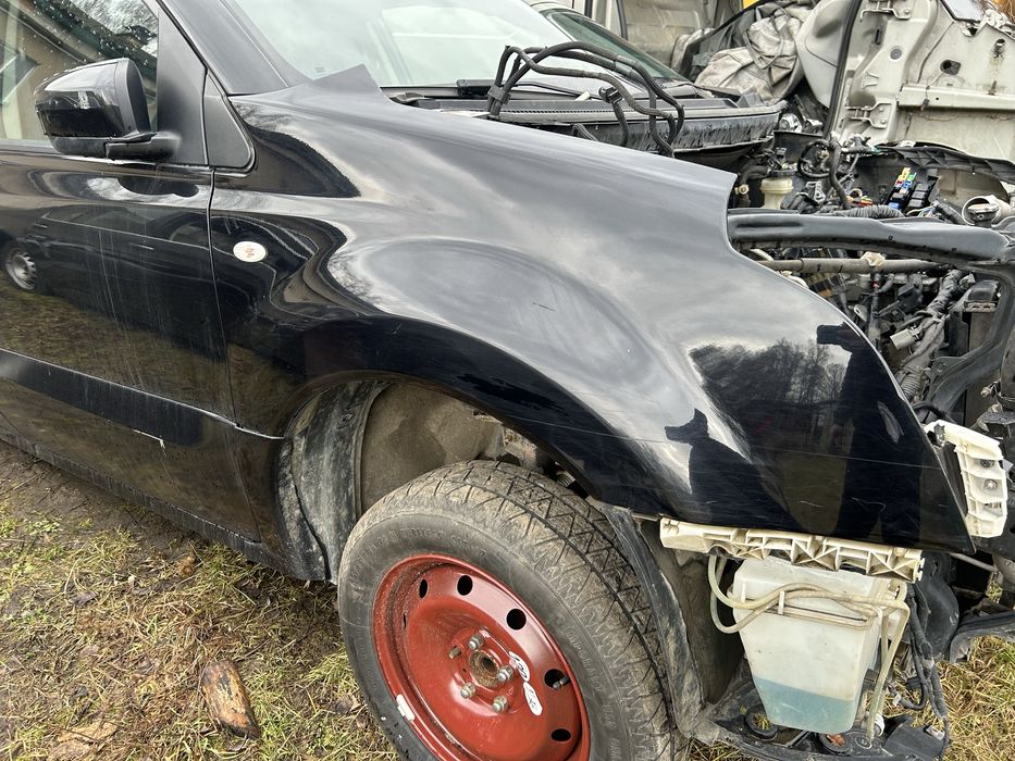 Blotnik prawy przod KOLEOS I kolor TEGXA